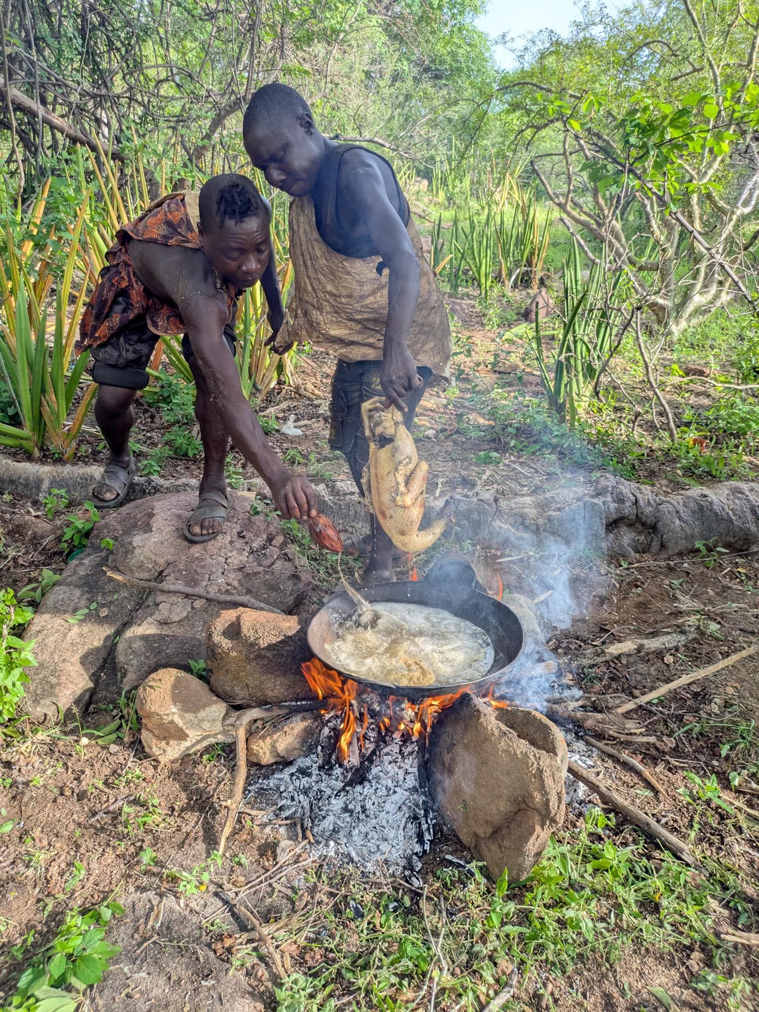 Hadzabe Preparing For Meal 